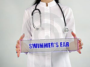 Conceptual photo about SWIMMER`S EAR Otitis Externa with written text photo