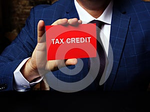 Conceptual photo about TAX CREDIT with written phrase. Business photo shows a dollar-for-dollar reduction of the income tax you