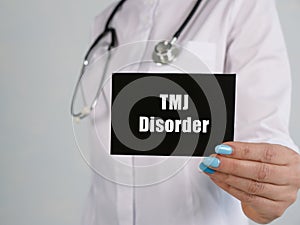 Conceptual photo about TMJ Disorder with handwritten phrase