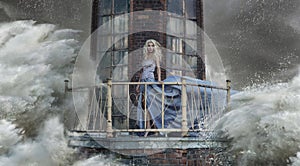 Conceptual photo of a woman standing on the lighthouse