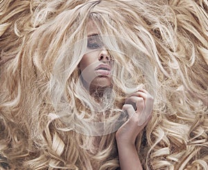 Conceptual photo of a women with lush wig