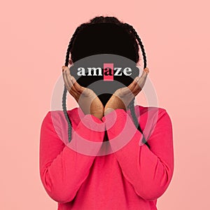 Conceptual portrait of little faceless girl with word amaze instead face. Human emotions, psychology, mental health