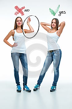 Conceptual portrait of two beautiful twin young women