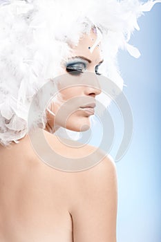 Conceptual portrait of woman in winter makeup