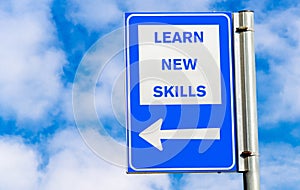 Conceptual road sign about learning new skills