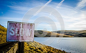 Conceptual Scenic Slow Sign