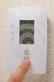 Conceptual Thermostat Saving Money