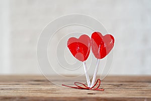 Conceptual Valentines image of note book with space for text, heart shaped chocolates and coffee