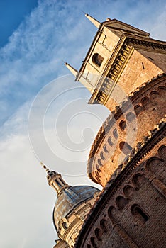 Conceptual vertical view of rotonda di san lorenzo and bell tower of Basilica in Mantua, Italy in day time with blue sky. Mantova