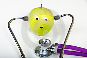 Doctors stethoscope and an eating apple
