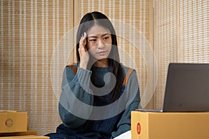concern nervous serius tired stressed businesswomen think hard working at laptop for plan to sell online internet photo