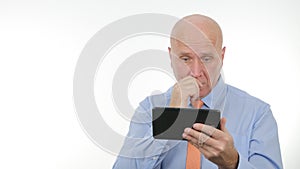 Concerned Businessman Reading Unbelievable Bad Financial News on Tablet