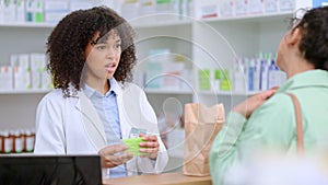 Concerned pharmacist assisting an upset and angry customer in a local pharmacy. Female client returning medication and