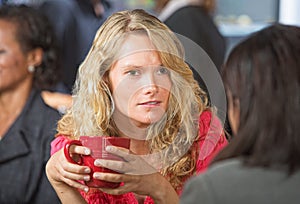 Concerned Woman in Cafe