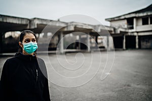 Concerned woman wearing a protective mask.Activities in time of epidemic/pandemic.Panic and fear of infection.Contamination