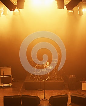 Concert, band and drums at stage for performance with instruments for live sound or gig. Music festival show, ready or