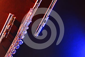 Concert concept for flute with dark detail and colorful lights