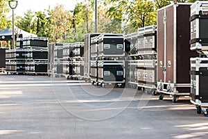 Concert containers. Boxes for equipment. Preparing the stage for a concert in the open air