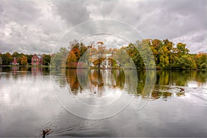 Concert Hall on the island of the Great Pond during golden fall mellow autumn in Catherine park, Pushkin, Saint Petersburg, Russ