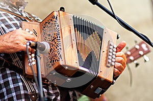 Concertina popular accordion player in the street photo