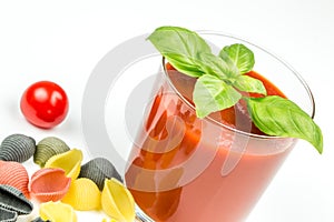 Conchiglie pasta and tomatoes with juice