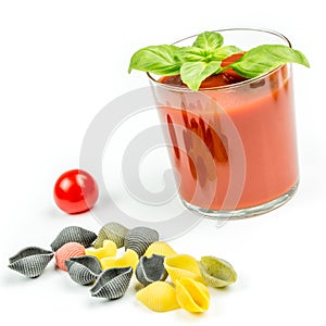 Conchiglie pasta and tomatoes with juice