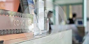 Concierge service counter of hotel, restaurant or apartment`s front desk in luxury reception hall in Thailand with staff working