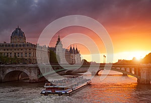 Conciergerie Building in Paris, France at sunset