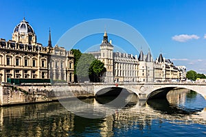 Conciergerie Castle and Bridge of Change over river Seine. Paris