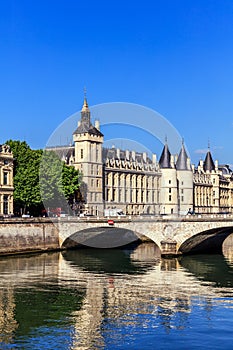 Conciergerie Castle and Bridge of Change over river Seine. Paris, France