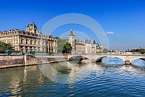 Conciergerie Castle and Bridge of Change over river Seine. Paris, France