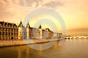 The Conciergerie at Justice Palace and Pont Neuf Bridge over the Seine River, Ile de la Cite, Paris