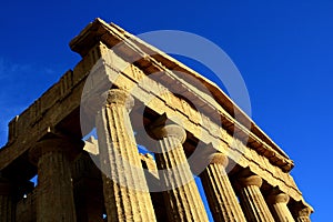Concordia temple top on blue sky. Agrigento Sicily