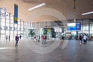 Concourse area inside a large modern railwy station terminal