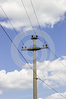 Concreet electrical pole with power lines