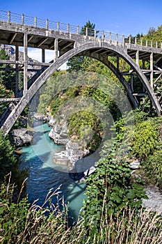 Concrete Arch structure of the Edith Cavell Bridge over the Shotover River in New Zealand