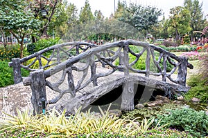 Concrete arched bridge in the park look like wooden bridge,Cement bridge