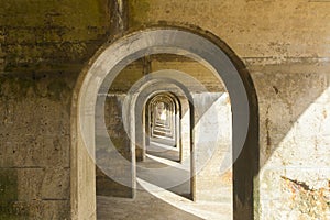 Concrete arches manmade structure, abstract pattern