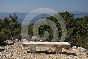 concrete bench with a view on mediterranean sea