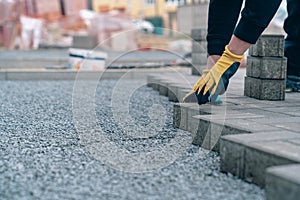 concrete block paving for the construction of a sidewalk