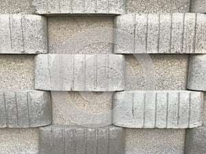 Concrete block wall constructed for Public toilet in Three dimensional view like in and out pattern using blocks cement and sand