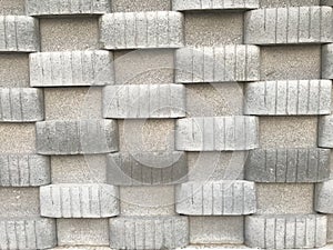 Concrete block wall constructed for Public toilet in Three dimensional view like in and out pattern using blocks cement and sand