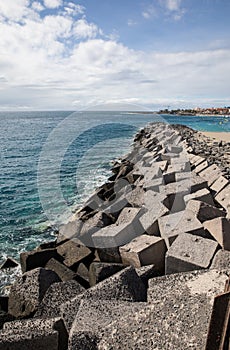 Concrete blocks in the jetty of Los Cristiano photo