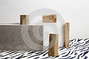 Concrete blocks, raw wood and zebra carpet.