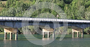 Concrete bridge over the lake