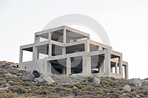 A concrete building under construction in the nature