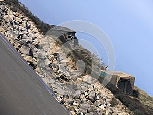 Concrete bunker, block house from the second world war on the edge of La Manche at Sainte CÃ©cile Plage in Picardie photo