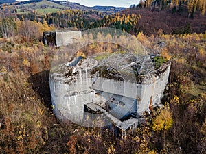 Concrete bunkers in the middle of meadows in czech borderland. Czechia photo
