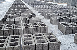 Concrete cinder blocks, building material in form of gray bricks. Use on the construction site.