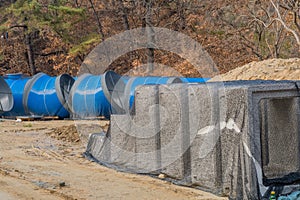 Concrete culvert sections and metal pipes